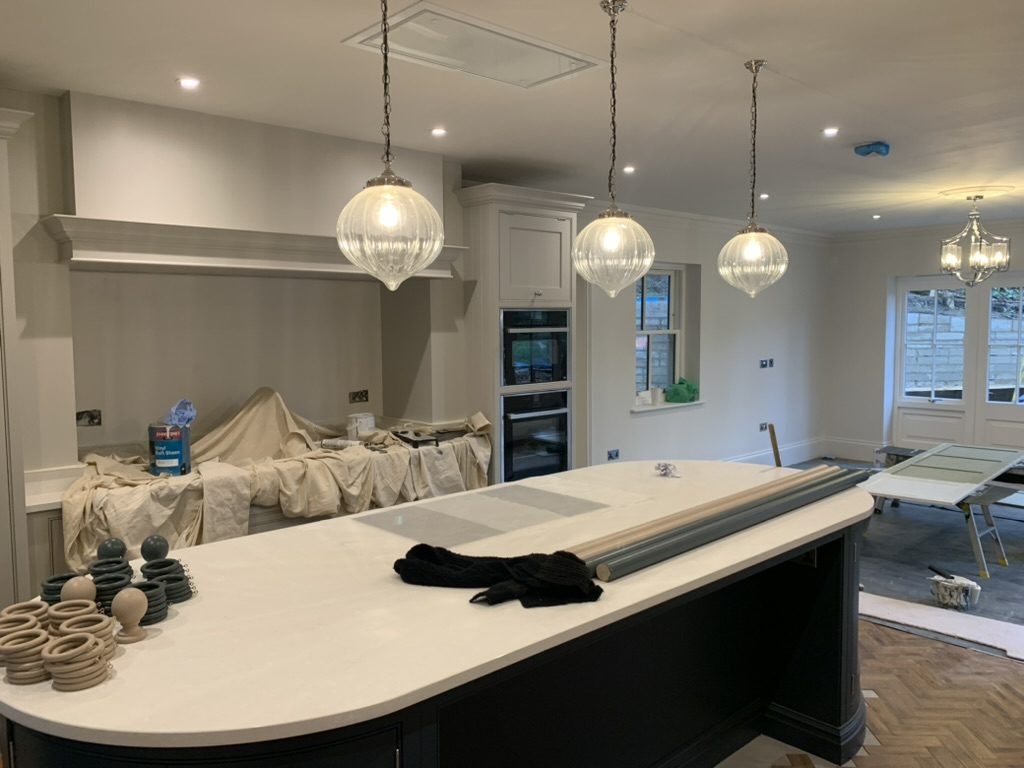 Indoor Lighting — Pendants, downlights, chandeliers and wall lights — designed in layers, not just wired in.